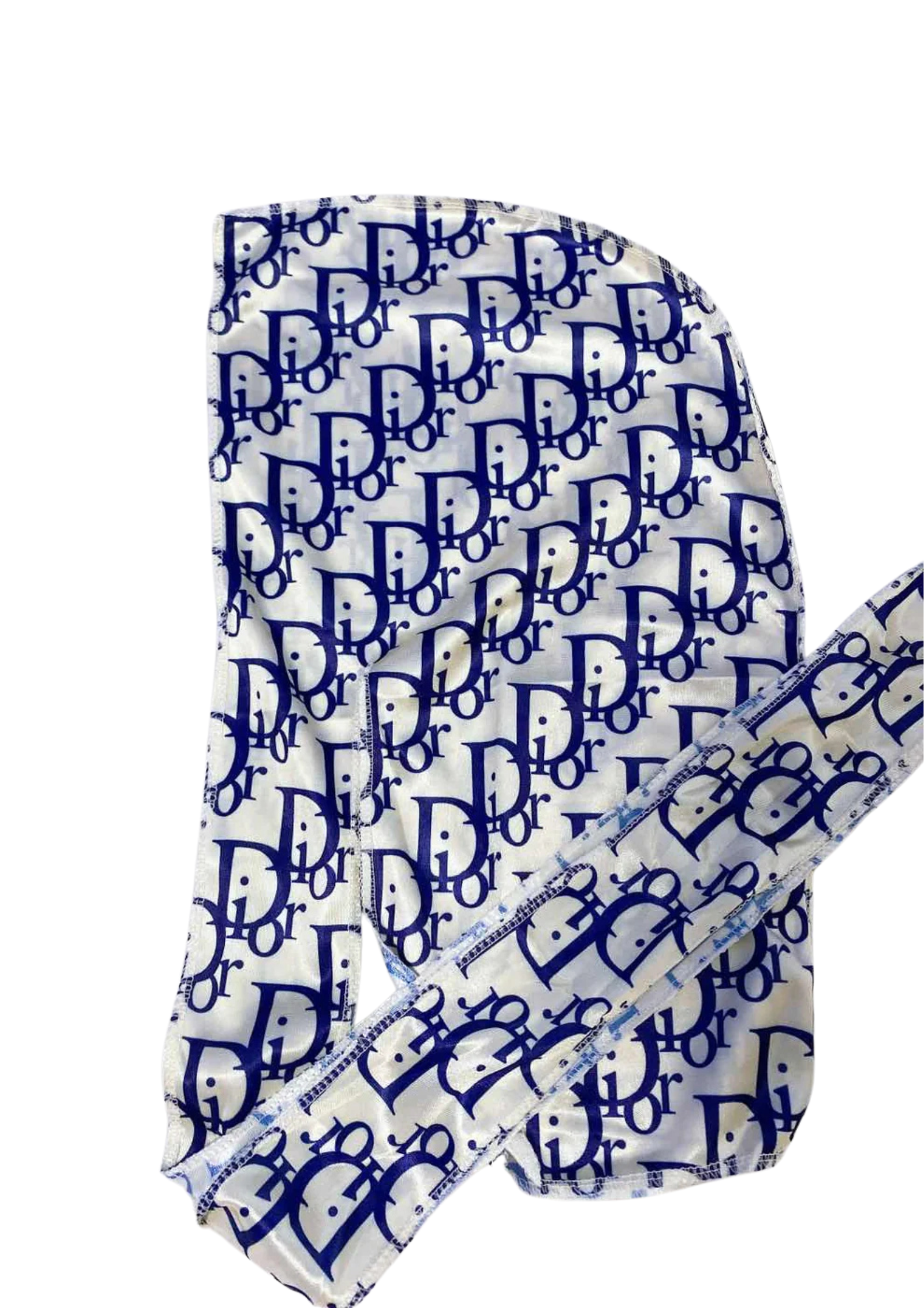Blue and white patterned headscarf on a white background