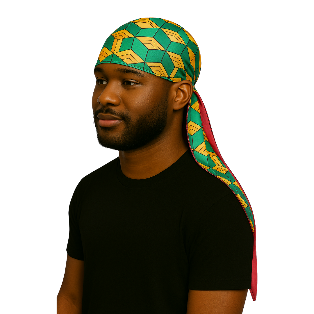 Tomiok - Silky Crown Durag worn by man with geometric green and yellow pattern, silky fabric and long tail.